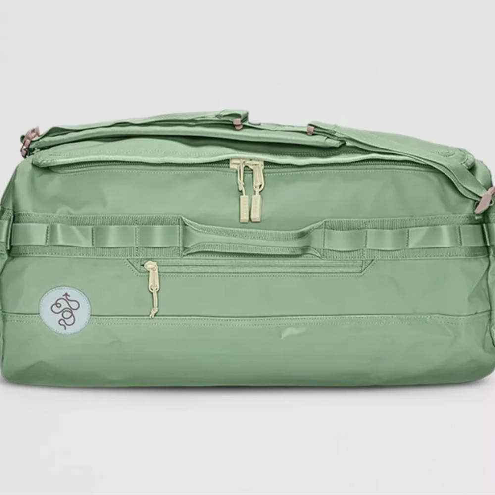 Baboon to the Moon Go Bag in size small in mineral green